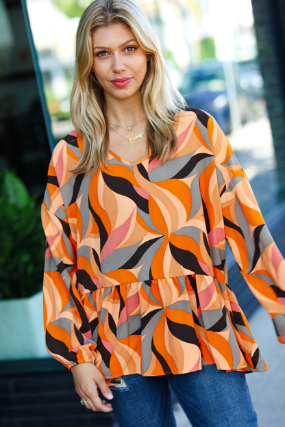 In My Thoughts Rust Abstract V Neck Peplum Top