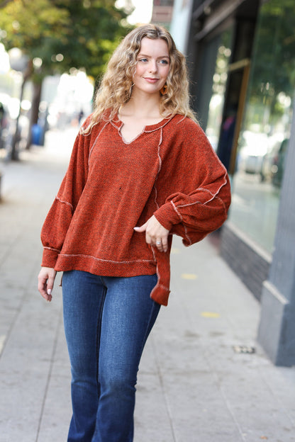 The Slouchy Rust Two Tone Knit Notched Raglan Top